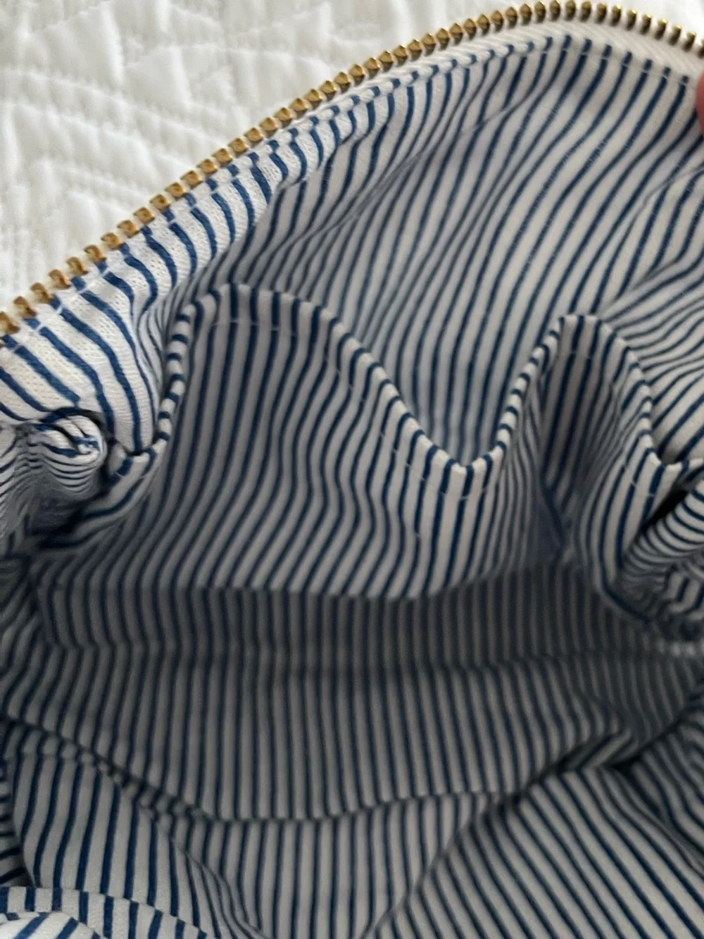 Sezane white and blue embroidery zip makeup bag